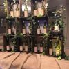 wine bottle table plan with vine close up