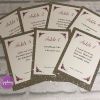 champagne glitter with purple roses table numbers with song quotes